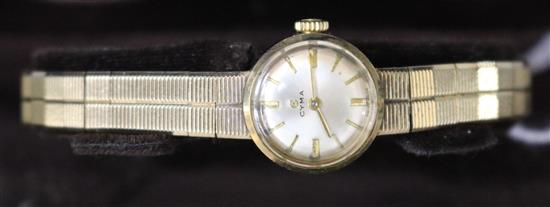 A ladys 1960s 9ct gold Cyma manual wind wrist watch, with original receipt and box.